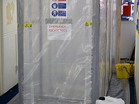 Asbestos enclosure bag-lock inside the school
