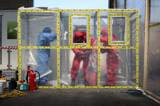 Asbestos operative team work waste removal baglock 3 Asbestos operative team work waste removal baglock 3
