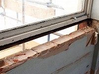 Cleaned bricks where asbestos has already been fully removed from the windowsills