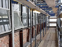 External scaffolding allowing access to the windows to remove asbestos to windowsills