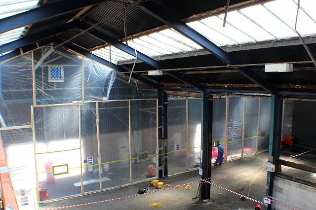 View of asbestos enclosure from scissor lift 2